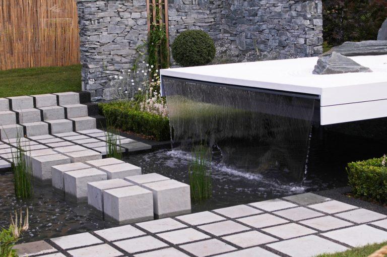 a,modern,water,garden,with,stepping,stones,making,a,impressive